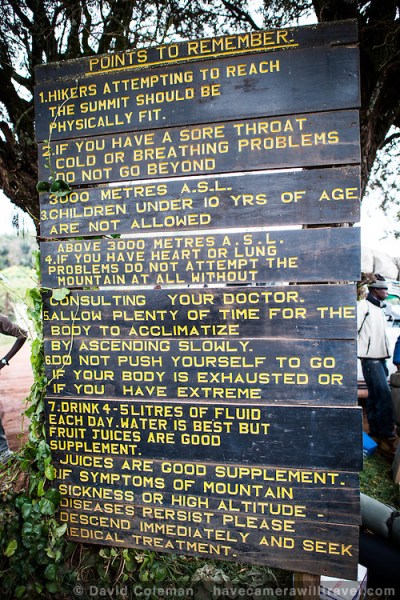 Mt-Kilimanjaro-Warning-Sign-at-Londorossi-Gate-L230074606